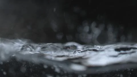 Abstract dark water wave/puddle background Foto stock