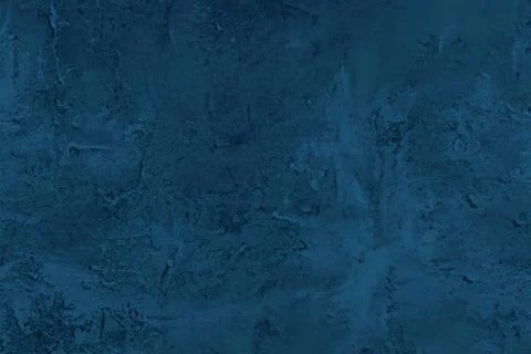 Abstract decorative dark blue plaster wall background Stock Photos