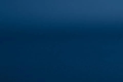 Abstract Deep Blue Gradient Texture Background with Shallow Depth of Field Ilustración de archivo