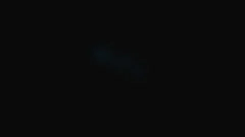 Abstract deep blue light flare glowing softly against a dark black backdrop Stock Footage 339617729