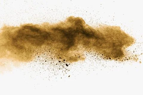 Abstract deep brown dust explosion on white background. Stock Photos