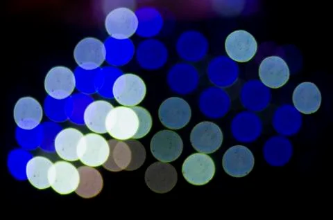 Abstract defocus lights over black Stock Photos