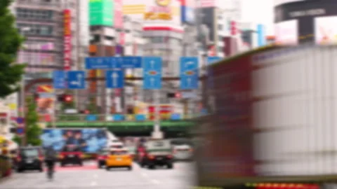 Abstract Defocus Timelapse of Shinjuku intersection with a lot of traffic Stock-Footage 187735315