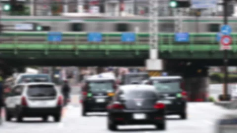 Abstract Defocus Timelapse of vehicle rushing through intersection in Shinjuku Stock Footage 187736225