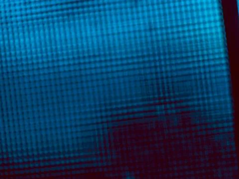 Abstract defocused blue pixel grid pattern with dark red shadow at the bott.. Stock Photos