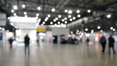 Abstract Defocused Blurred Background flow of many people inside space Stock Footage 148695009