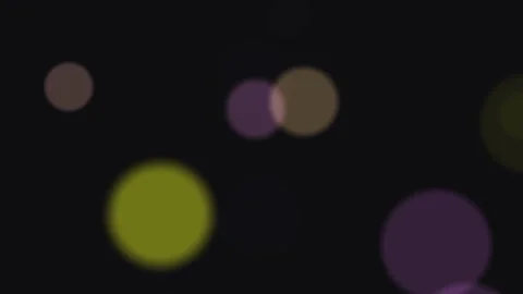 Abstract defocused bokeh circles animation on black background Stock Footage 323695217