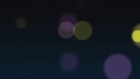 Abstract defocused bokeh circles animation on dark blue grainy background with Stock Footage 323805865
