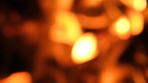 Abstract defocused close-up of glowing orange and yellow campfire flames Stock-Footage 347382071