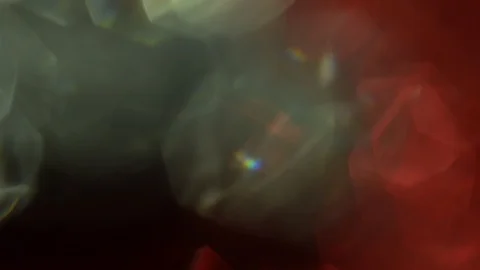 Abstract defocused crystal red and green elements on a dark background. Stock Footage 93624451