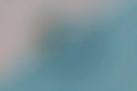 Abstract defocused gradient in cool blue and gray tones, creating a calm mi.. 스톡 일러스트