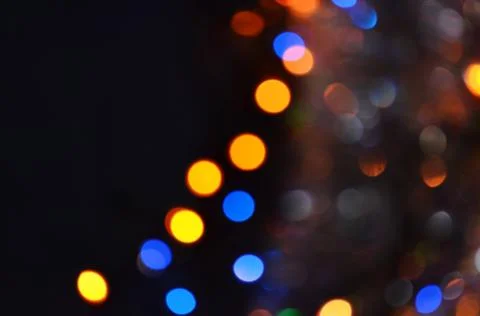 Abstract defocused light on black background 库存照片
