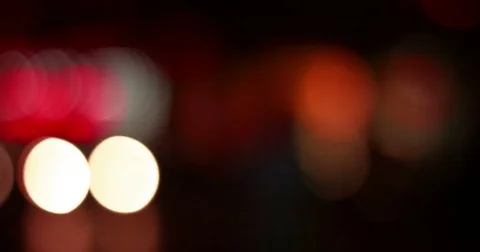 Abstract defocused night traffic city lights bokeh background, car lights city Stock Footage 76894530