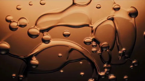 Abstract depiction of water bubbles elegantly positioned on a rich brown 스톡 동영상 305848721