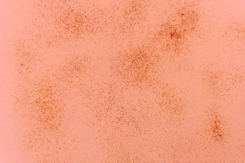 Abstract design with reddish speckles on a light background 스톡 사진