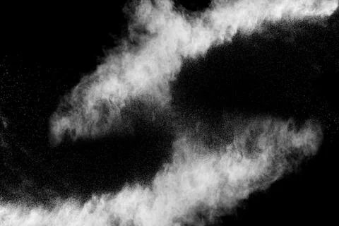 Abstract design of white powder cloud against dark background Stock Photos