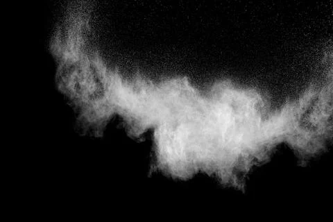 Abstract design of white powder cloud against dark background Stock Photos