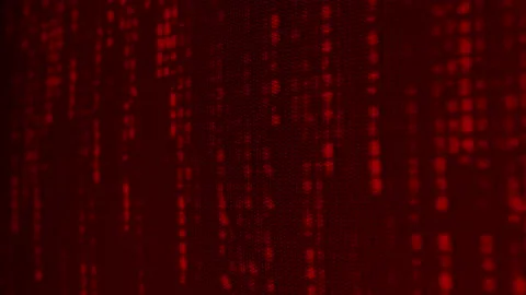 Abstract Detailed Macro Close up of Streaming Red Binary Code on Computer Screen Stockbeeldmateriaal 219594207