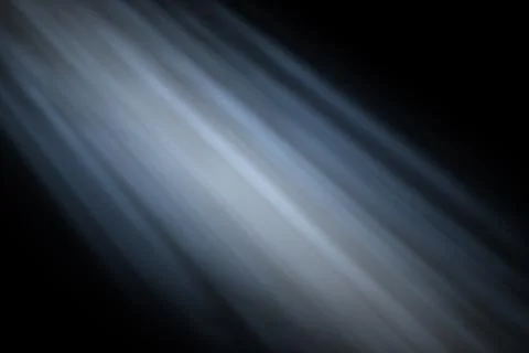Abstract diagonal blue and white light rays on a dark background creating a.. 库存插图