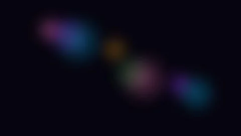 An abstract diagonal sequence of soft colorful light flares on black Stock Footage 338309656