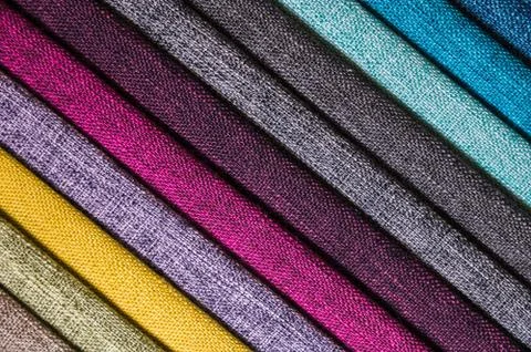 Abstract diagonal textile background multicolored stripes from factory Stock Photos