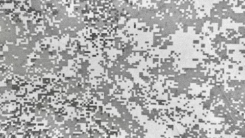 Abstract digital camouflage pattern on tactical military fabric textile in .. Foto stock