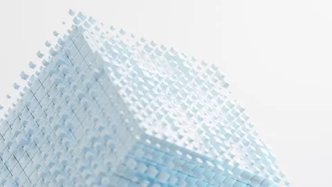 Abstract digital cube dissipating into small light blue and white particles 스톡 동영상 327249611