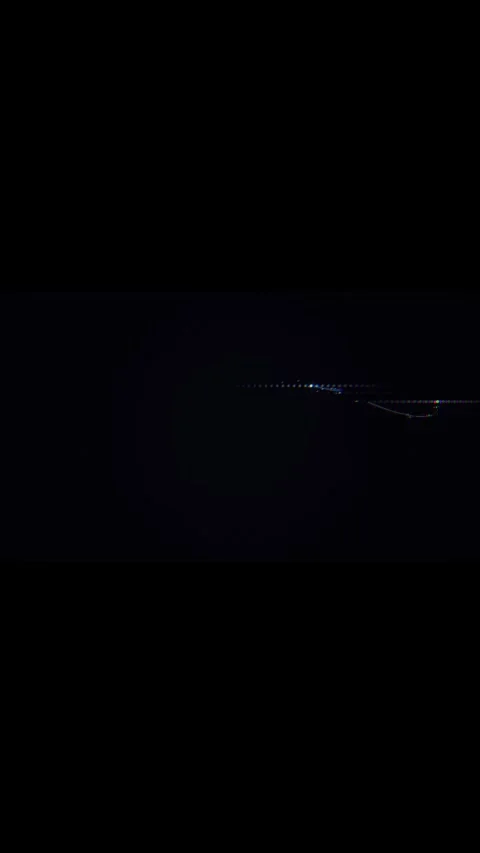 Abstract digital dot matrix particle lines glowing on dark background Stock Footage 346748886