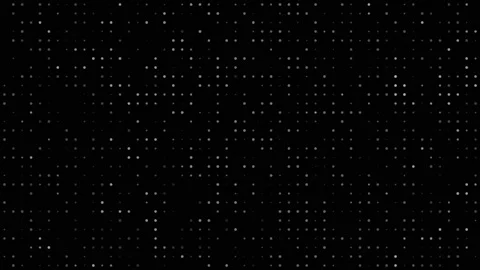 Abstract digital grid of shimmering white dots on black background Stock Footage 335937907