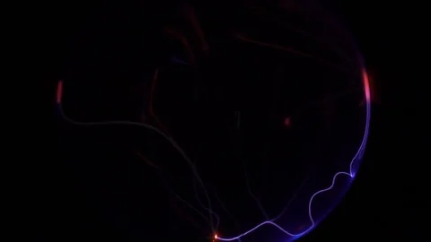Abstract discharges inside the plasma ball Stock Footage 83702313