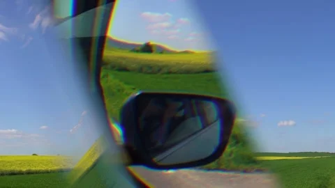 Abstract Distortion of Car Window View On The Yellow Field Stock Footage 240098266