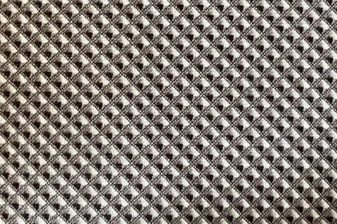 An abstract of a dizzy effect with black and white mesh pattern -Trypophobia  Stock Illustration
