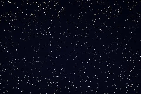Abstract Dots on Dark Background. Dark blue background with gold dots. Fabric Stock Photos