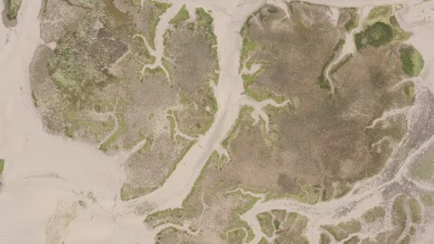 Abstract drone view of a low tide rivermouth in Spain (2) Stock Footage 112244396