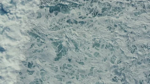 Abstract drone view of tidal waves splashing and foaming Stock Footage 133301075