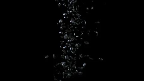 Abstract Droplets Falling Over Black Background and Landing in Bucket Stock Footage 73063499