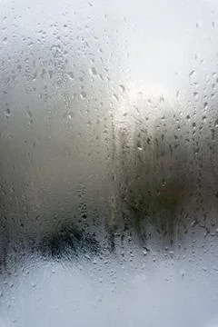 Abstract drops of rain on car window Stock Photos