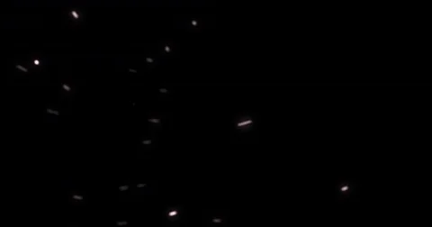 Abstract dust particles movement on dark back background loop seamless Stock Footage 72982479