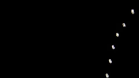 Abstract Dust Particles Sparkling In Low Light Dark Background Stock Footage 328228665
