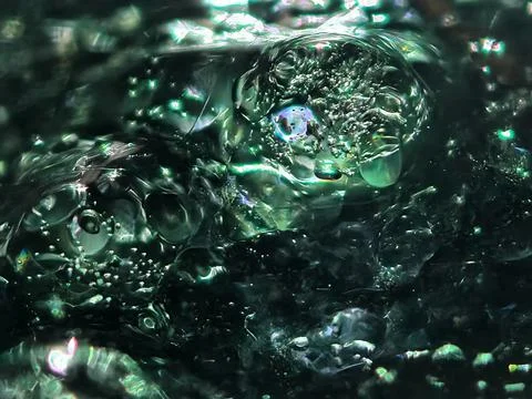 Abstract emerald bubbles with metallic liquid texture beautiful unique image Stock Photos
