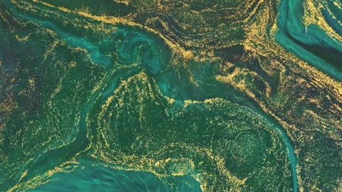 Abstract emerald green fluid marble with elegant gold veins and swirls Stock Footage 331591849