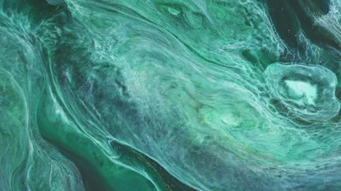 Abstract emerald green fluid marble with elegant gold veins and swirls Stock Footage 331592232