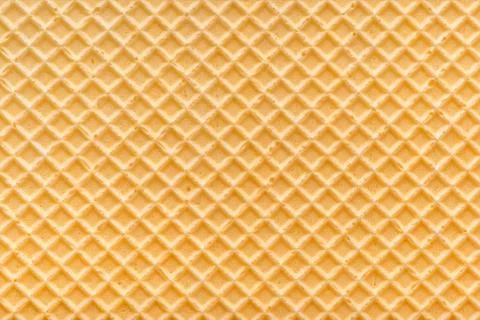Abstract empty golden waffle texture, background for your design Stock Photos
