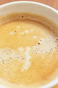 Abstract espresso foam pattern photographed from above. Stock Photos