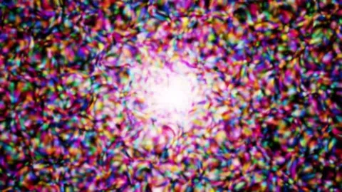 Abstract exploding light burst with colorful particles in cinematic motion .. 스톡 동영상 343418943
