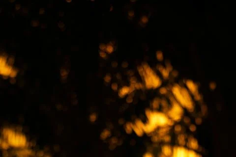 An abstract expression of golden light patterns against the inky cloak of nig Stock Photos