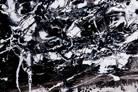 Abstract expressionism pattern. Style of drip painting. Black and white paint 库存照片