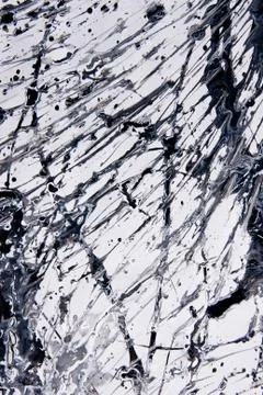Abstract expressionism pattern. Style of drip painting. Black and white paint 库存照片