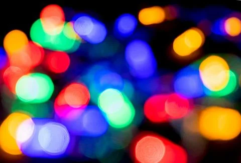Abstract festive background of  blurry garland lights. Foto stock