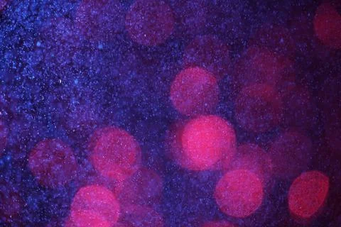 Abstract festive background with selective focus. Blurred red spot on dark blue Stock-Illustration